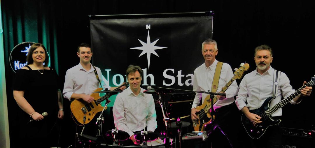 North Star band posing with their instruments